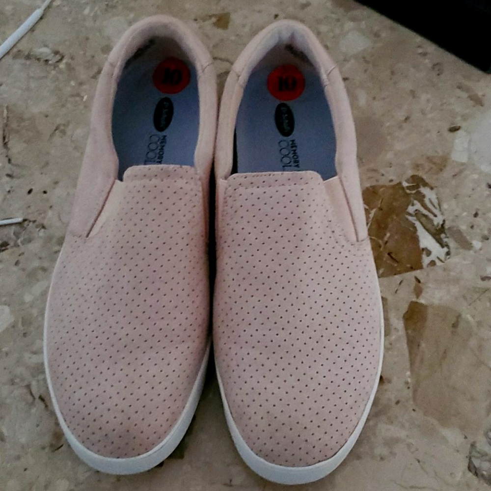 Nike sneakers.  Slips on sneakers